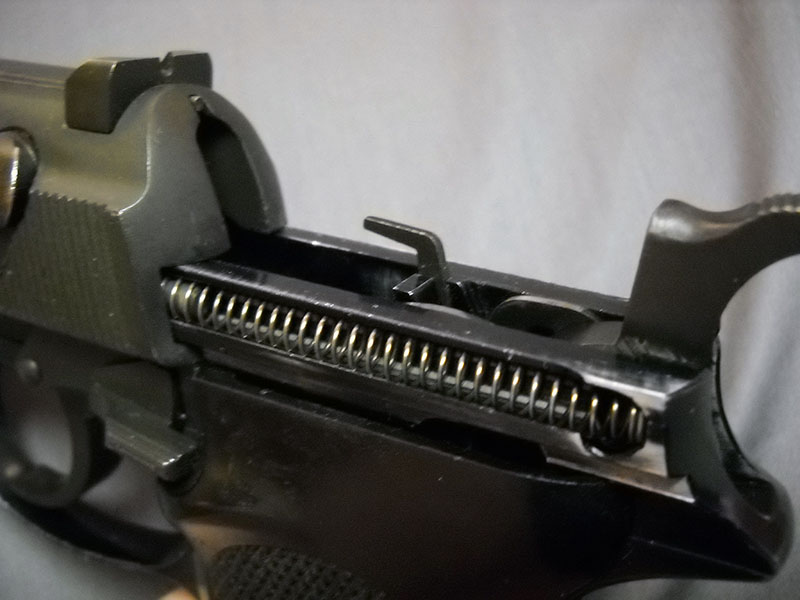 detail, P38 ejector with slide partially reinstalled